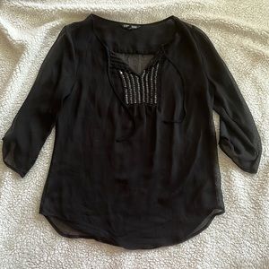 Sheer, flowy black top